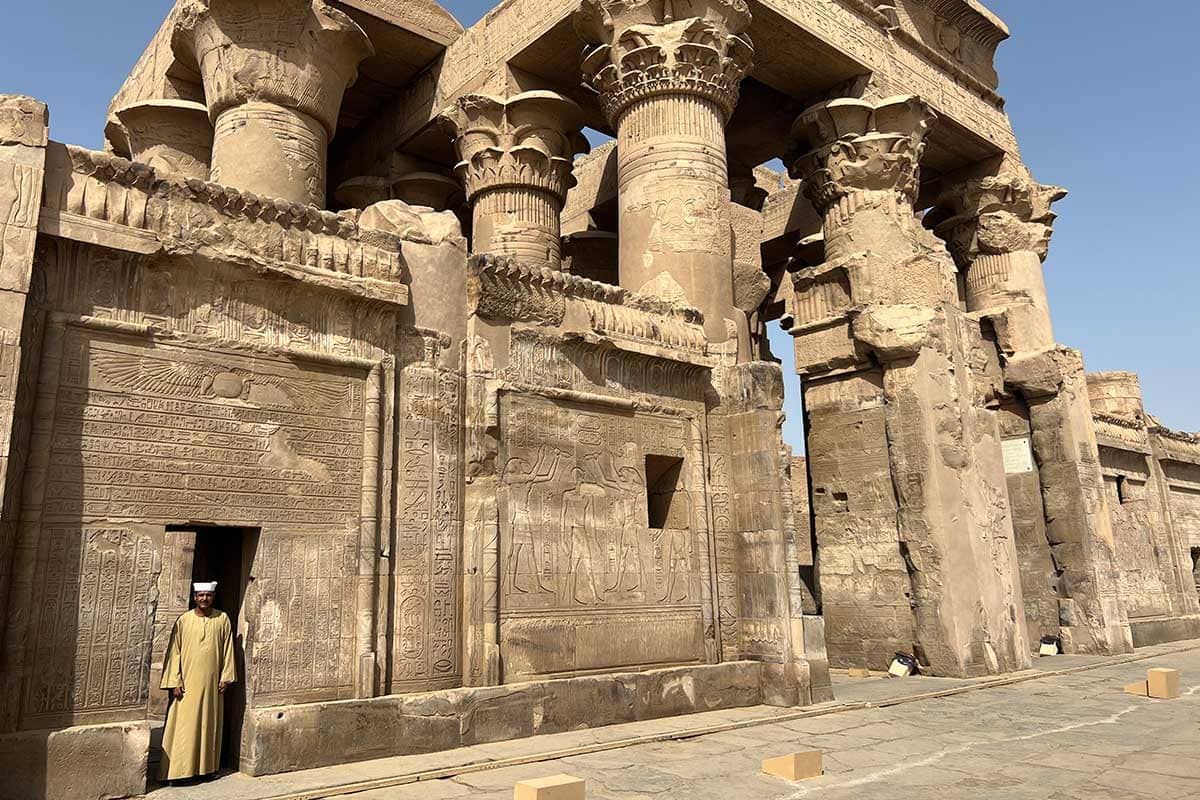 The ancient Kom Ombo Temple in Egypt with towering stone columns and intricate carvings under a clear blue sky
